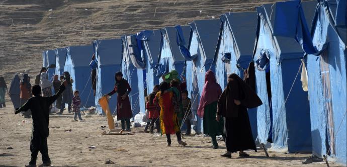 Des personnes afghanes déplacées suite aux combats entre les forces afghanes et les insurgés Talibans.