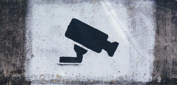 Affiche avec caméra de surveillance
