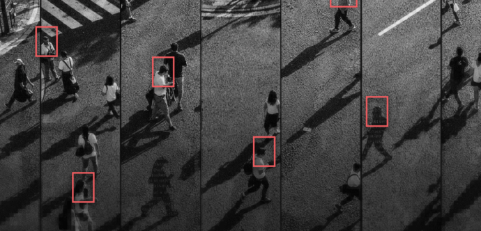 vue panoramique sur des gens qui marchent dasn la rue et certains d'entre eux sont encadrés par un carré rouge comme une target