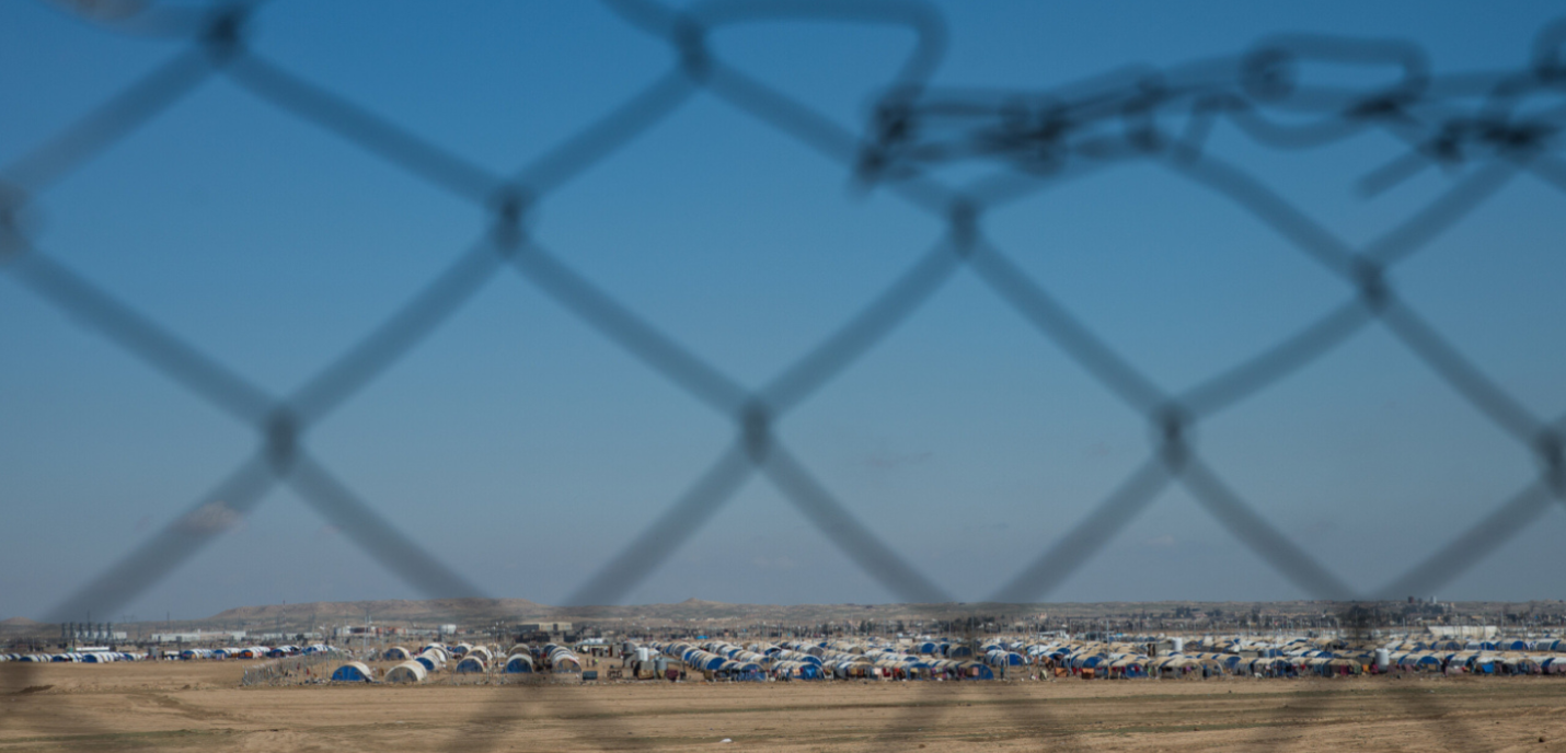 Centre de réinsertion locale d’Al Jeddah vu à travers des barreaux