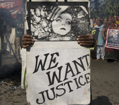 Affiche portant l'inscription "We want justice"