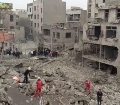 Still from a video that shows parts of the police station in Javadieh destroyed, as well as destruction and damage to other surrounding buildings in Ghorbani street
